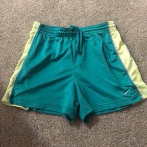 Green and yellow Nike shorts size small
